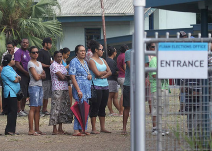 Fijian voters line up at a polling station in Suva, Fiji