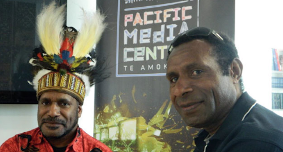 West Papuan parliamentarian and lawyer Benny Wendy (left) with Papua New Guinean postgraduate research student Henry Yamo