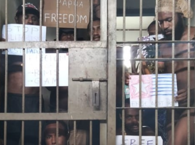 Jailed flag-raiser Melvin Yobe and his friends took a group photo before undergoing a 