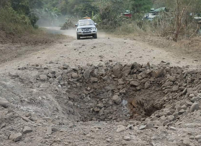 An airstrike narrowly misses a civilian vehicle in Myanmar in January 2023