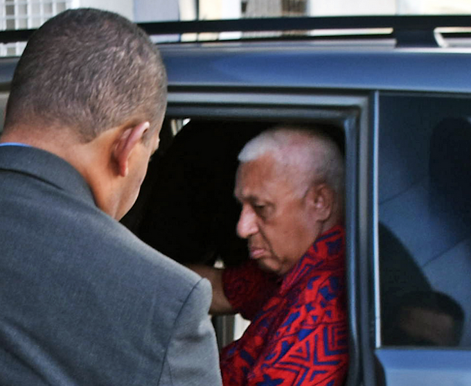 Former Fiji prime minister Voreqe Bainimarama arrives at the Police CID headquarters in Suva