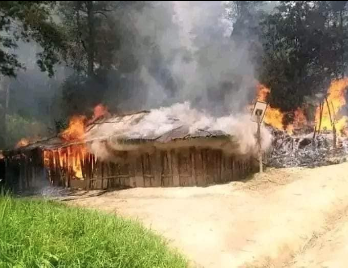 A burning West Papuan honai (traditional house) alleged to have been set alight by Indonesian troops in an unnamed village