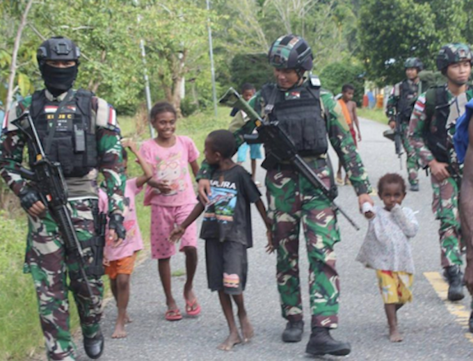 Change of tactics . . . while the Indonesian military have increased their crackdown in West Papua some soldiers have also been engaged in a softer 