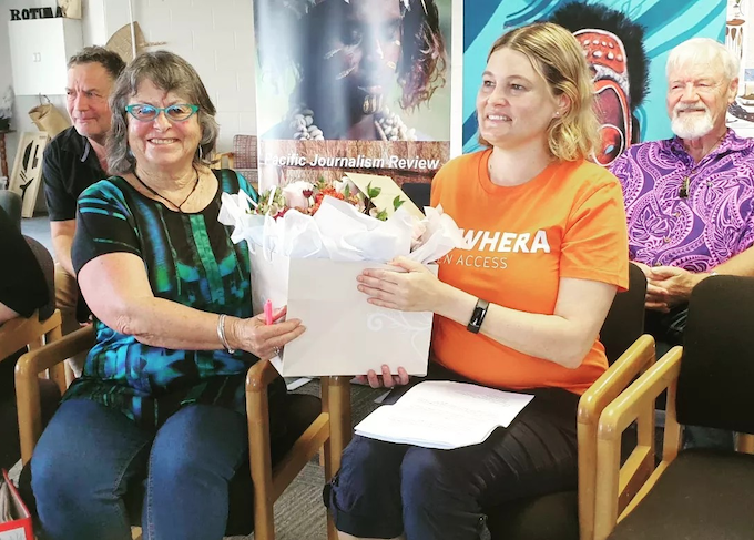 Asia Pacific Media Network chair Dr Heather Devere presents a bouquet