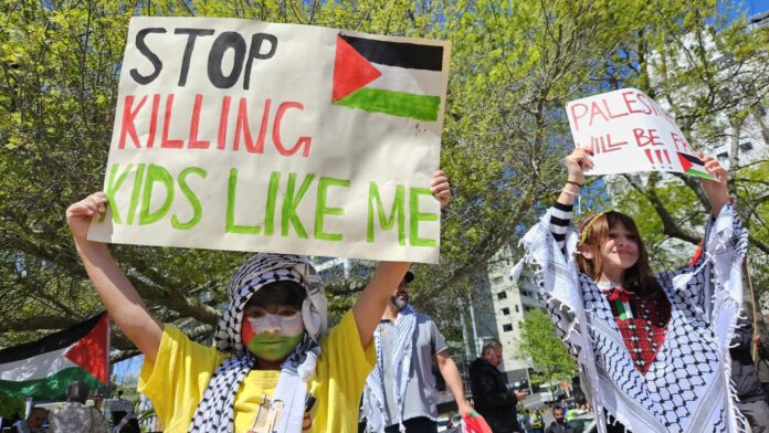 Two of the many children taking part in today's solidarity rally for Palestine