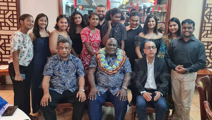 PNG Communications Minister Timothy Masiu (centre) with the USP journalism students at the annual awards in Suva last night