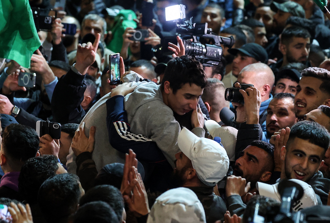 Palestinian families from across the West Bank gather in Ramallah for an upcoming prisoner release