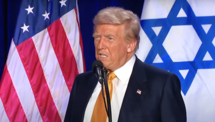 Donald Trump literally standing before an Israeli flag and vowing to kill free speech for the advancement of Israeli information interests