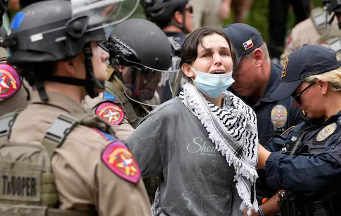 A student is arrested at a pro-Palestinian protest at the University of Texas on April 24, 2024