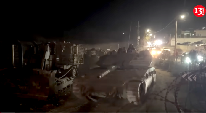 Israeli tanks crossing the Syrian border