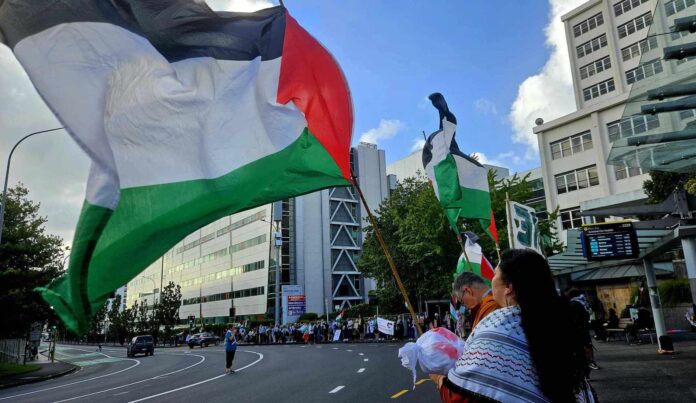 New Zealand protesters against the genocide and attacks on the healthcare workers and hospitals in Gaza outside Auckland Hospital