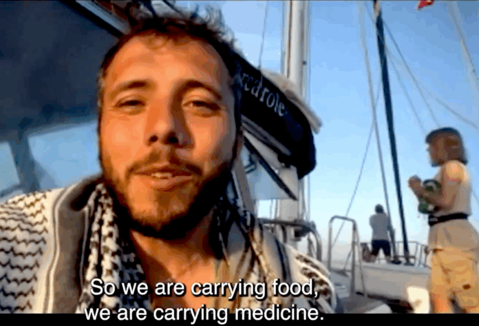 Brazilian Gaza Freedom Flotilla peace activist Thiago Ávila in an interview with journalist Abby Martin before being kidnapped by Israeli forces