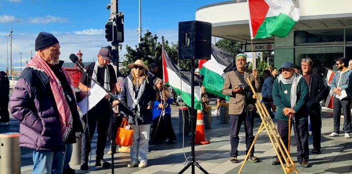 Journalist, media academic and author Dr David Robie, convenor of Pacific Media Watch and who is one of the signatories to the media industry open letter, speaking among other press freedom advocates at the Palestinian rally in Auckland's Te Komititanga Square