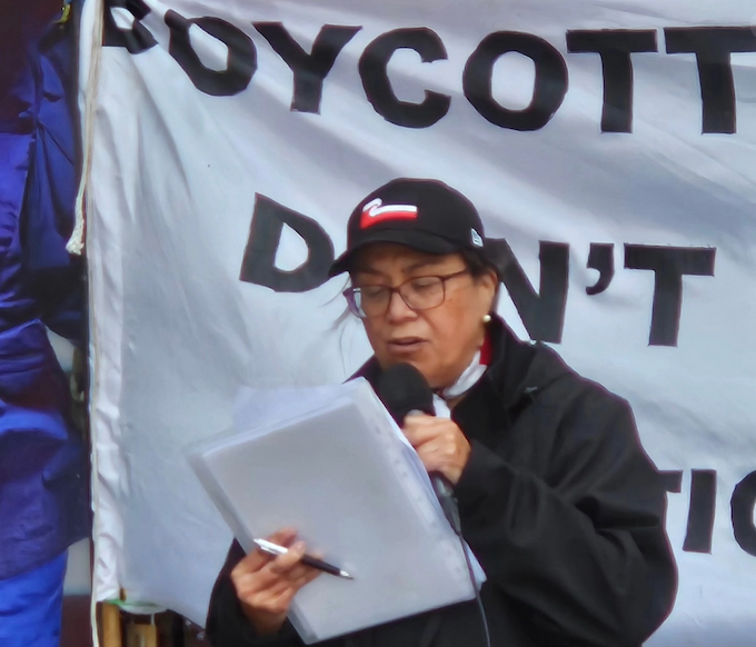 PSNA activist Leeann Wahanui-Peters reading out Will Alexander’s speech at the Auckland protest