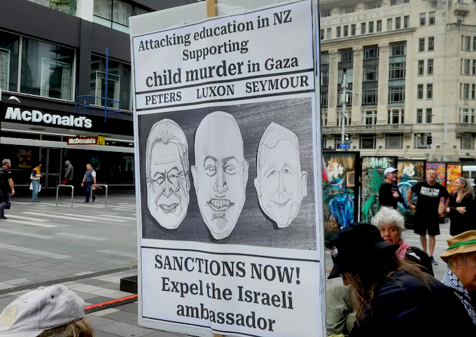 "Sanctions now" placard pictured outside a McDonalds store