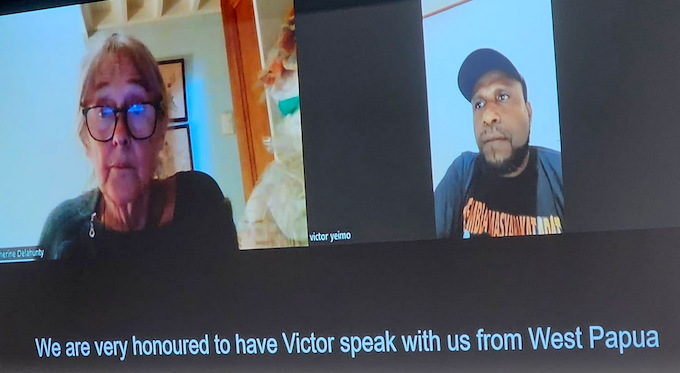Catherine Delahunty introduces Viktor Yeimo in a video link message