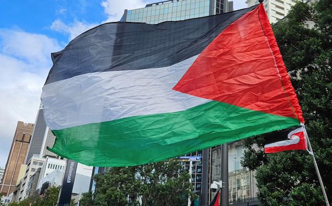A Palestinian and a Tino Rangatiratanga flag fluttering in the breeze